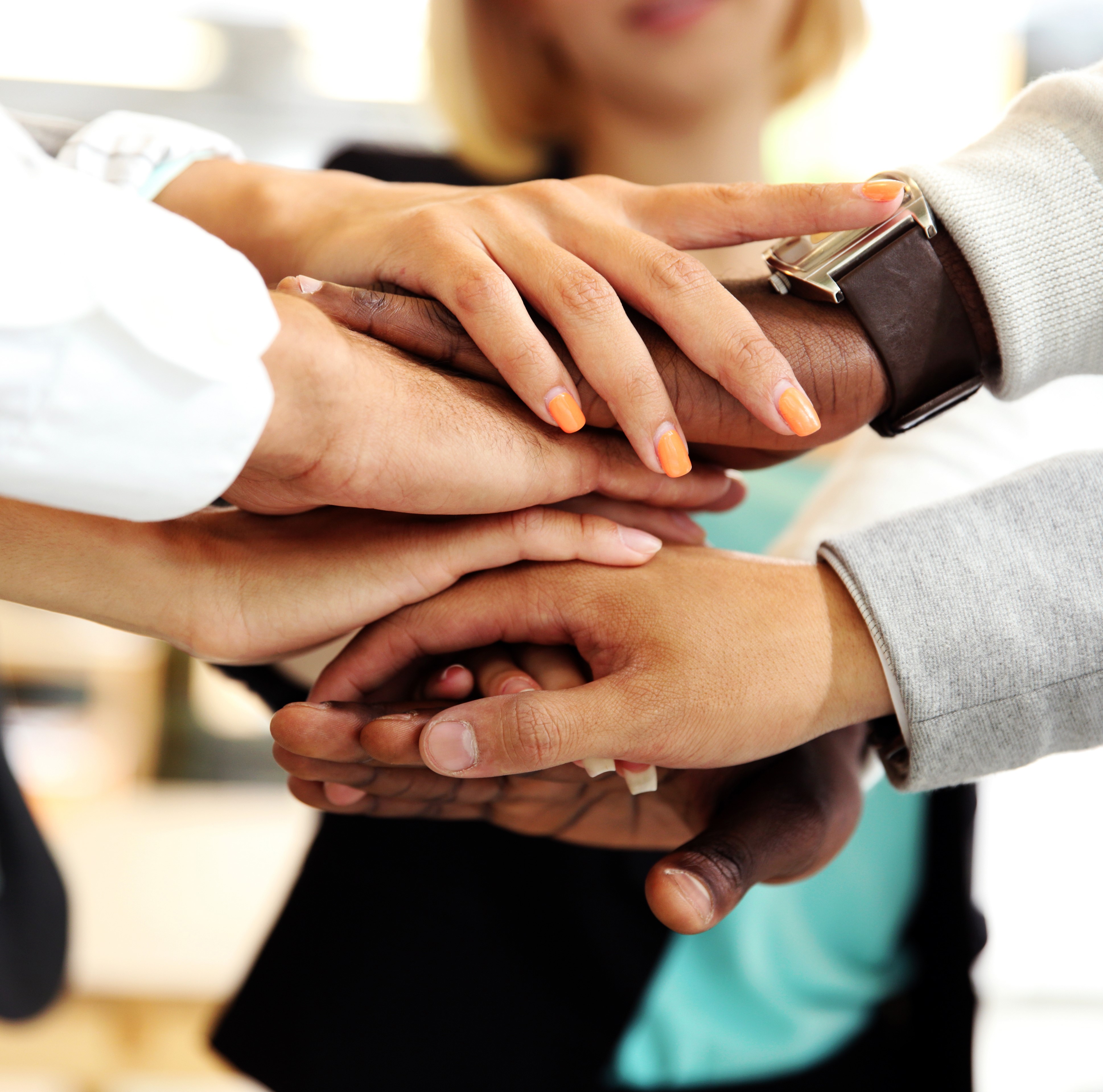 Business people joining hands