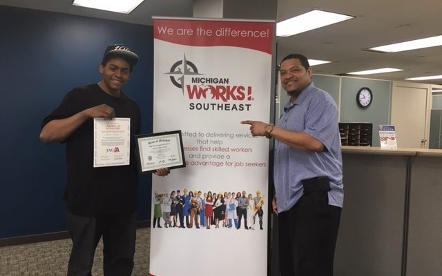 Steven (L) and Michael (R) posing for a picture at Michigan Works! with his GED!